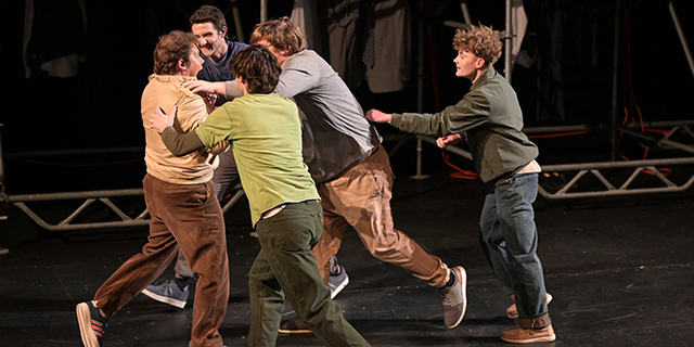 a group of men on a stage